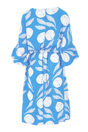 Product shot of the Solnedgang Dress in colour Circflwr (Blue), from the back