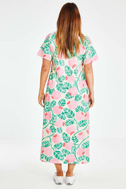 Model Laura wearing size 14 of the Helg Tee Dress in colour Crelingon, from the back