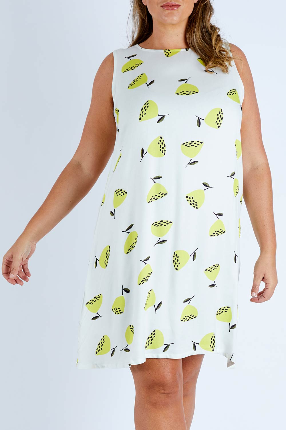 Model Fiona wearing size 16 of the Bestyr Dress in colour Flwrpods, from the front, cropped image