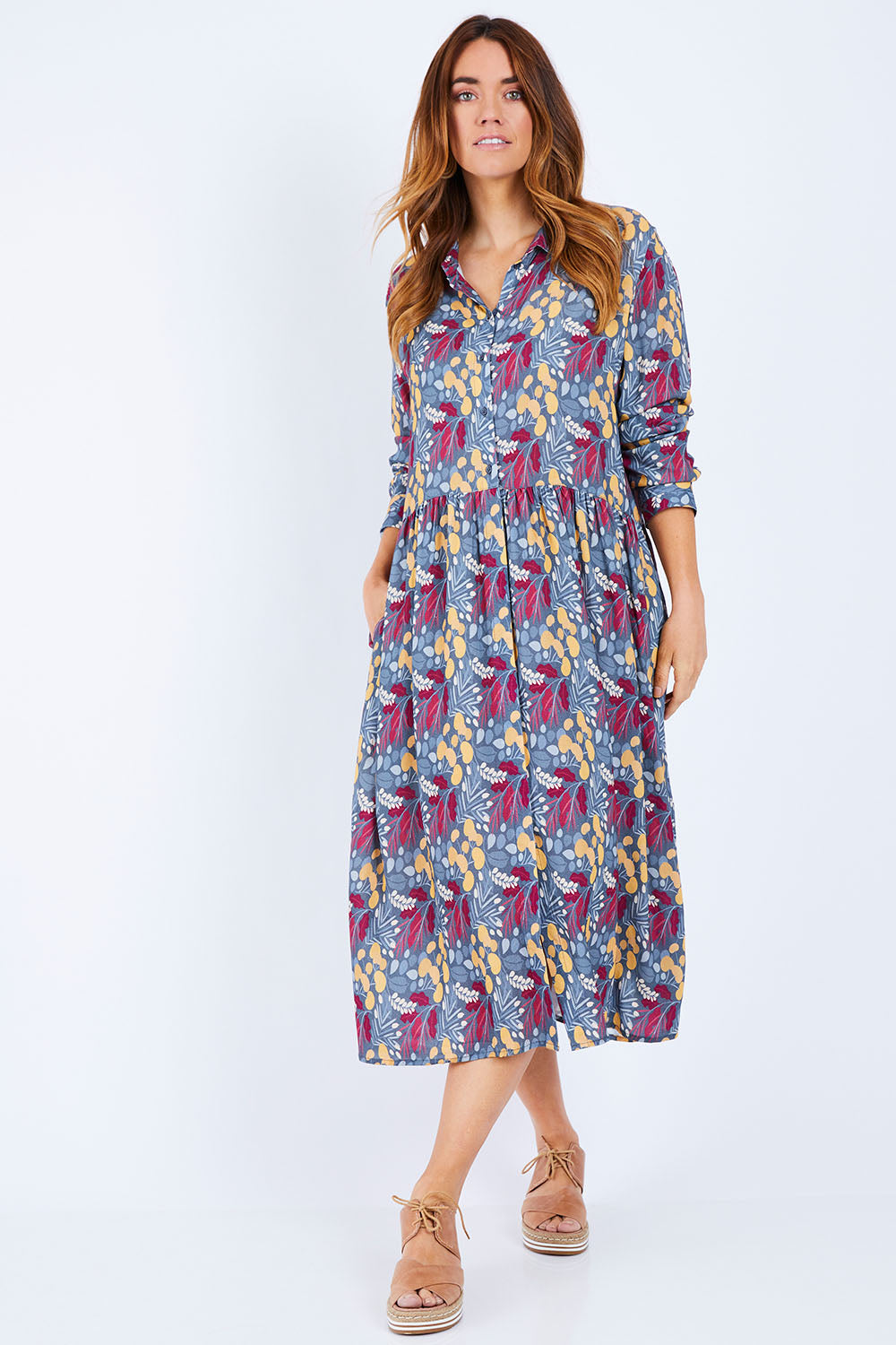 Model Laura wearing size 14 of the Lekfull Shirt Dress in colour Forage (Blue), from the front, showing the whole outfit