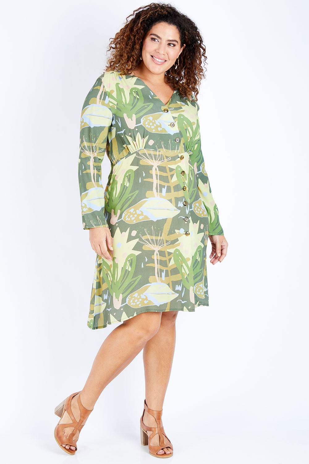 Model Jess wearing size 16 of the Bojd Button Dress in colour Jungle (Green), from the front, showing the whole outfit