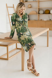 Model Phoebe wearing size 10 of the Bojd Button Dress in colour Jungle (Green), from the front, showing the whole outfit