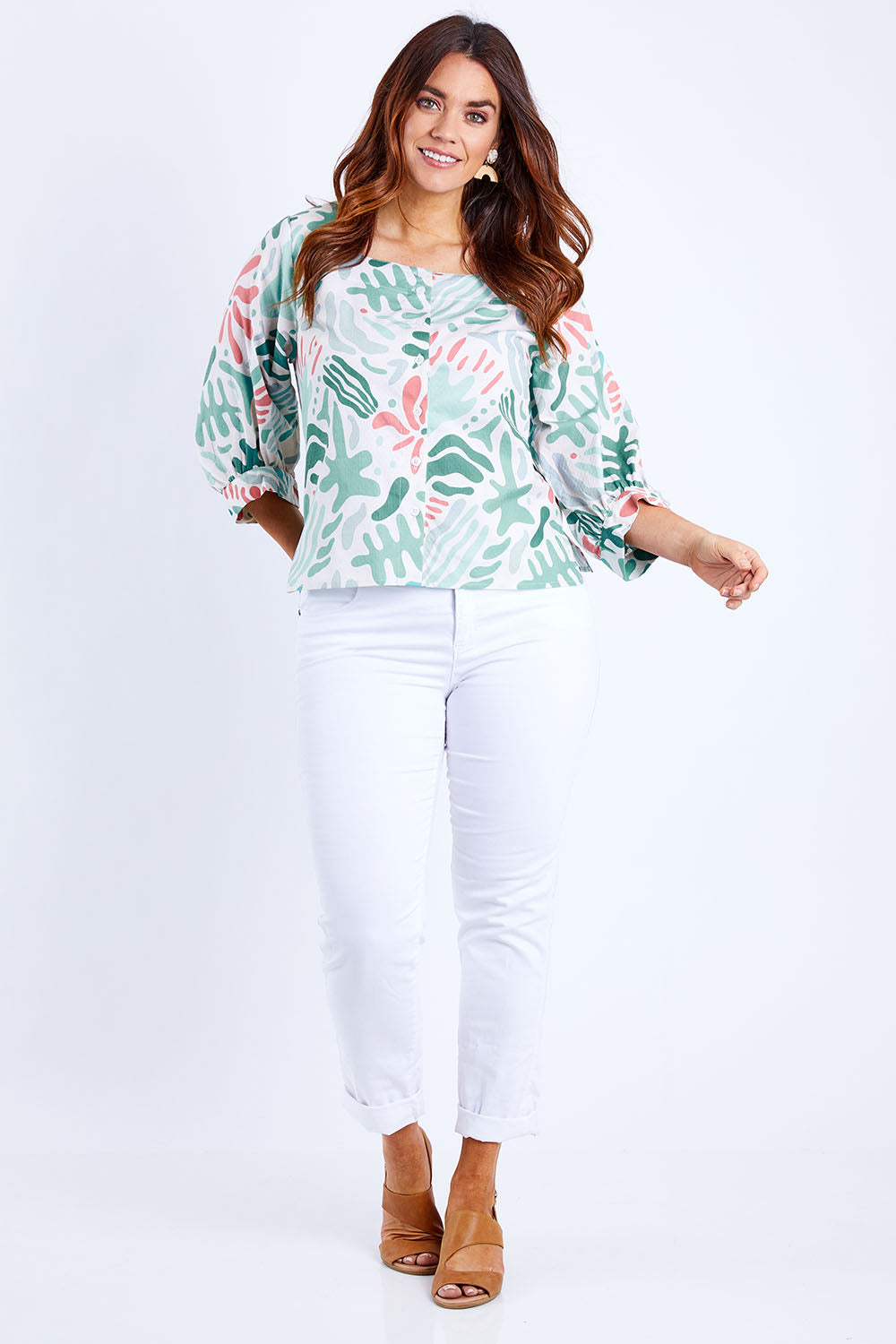 Model Laura wearing size 14 of the Fyrkant Neck Blouse in colour Splatter (Green), from the front, showing the whole outfit