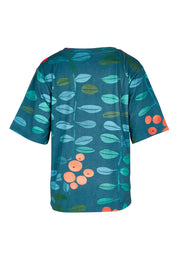 Product shot of the Solsken Tee in colour Navjuniper (Blue), from the back