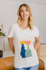 Model Phoebe wearing size 10 of the Mid Century Cotton Print Tee in colour White (White), from the front, showing the whole outfit