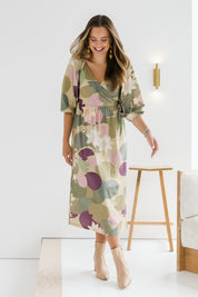 Model Tahlia wearing size 10 of the Romantik Dress in colour Lilypink (Pink), from the front, showing the whole outfit