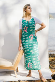 Model Phoebe wearing size 10 of the Flytande Maxi Dress in colour Grejuniper (Green), from the front, showing the whole outfit