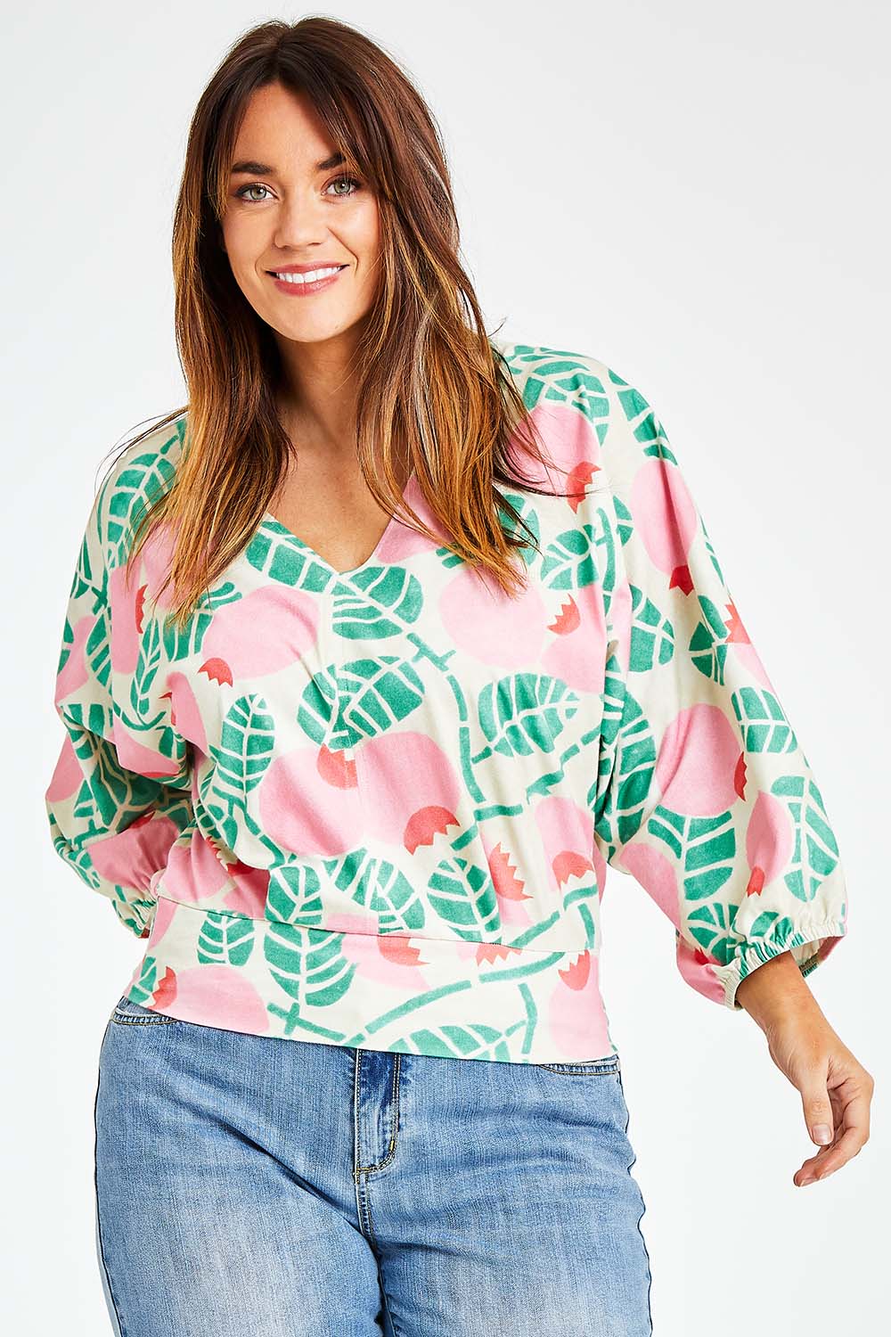 Model Laura wearing size 14 of the Sarskild Batwing Top in colour Crelingon, from the front, cropped image