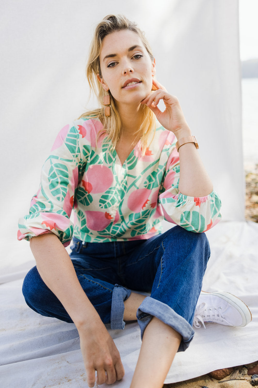 Model Phoebe wearing size 10 of the Sarskild Batwing Top in colour Crelingon, from the front, showing the whole outfit