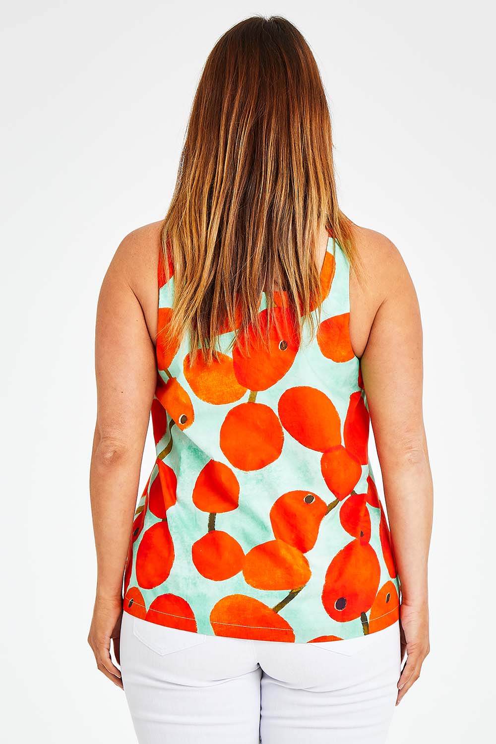 Model Laura wearing size 14 of the Undra Tank in colour Redberry (Red), from the back