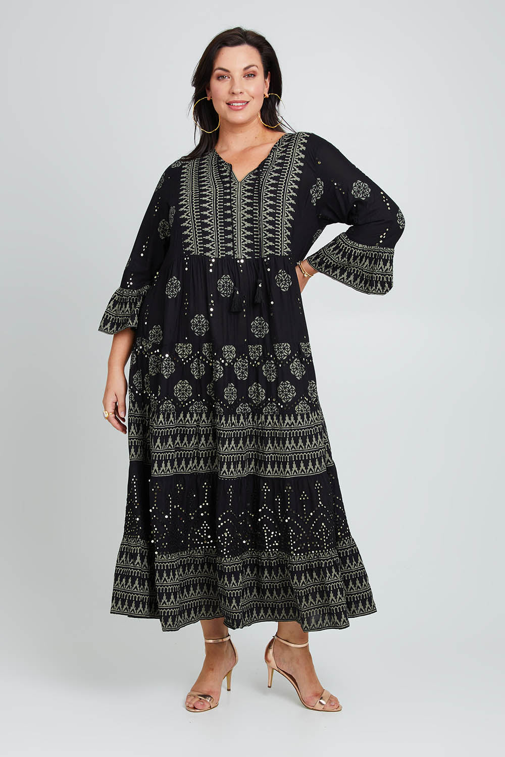 Model Poppy wearing size 16 of the Palm Beach Maxi Dress in colour Black (Black), from the front, showing the whole outfit