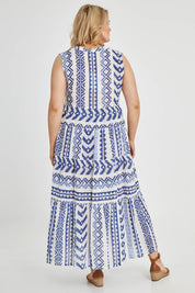Model Keeara wearing size 16 of the Mollymook Cotton Maxi Dress in colour Blue (Blue), from the back