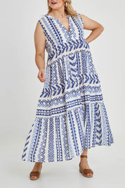 Model Keeara wearing size 16 of the Mollymook Cotton Maxi Dress in colour Blue (Blue), from the front, cropped image