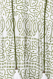 Product shot of the Cocora Valley Cotton Dress – Olive in colour Olive, showing detail