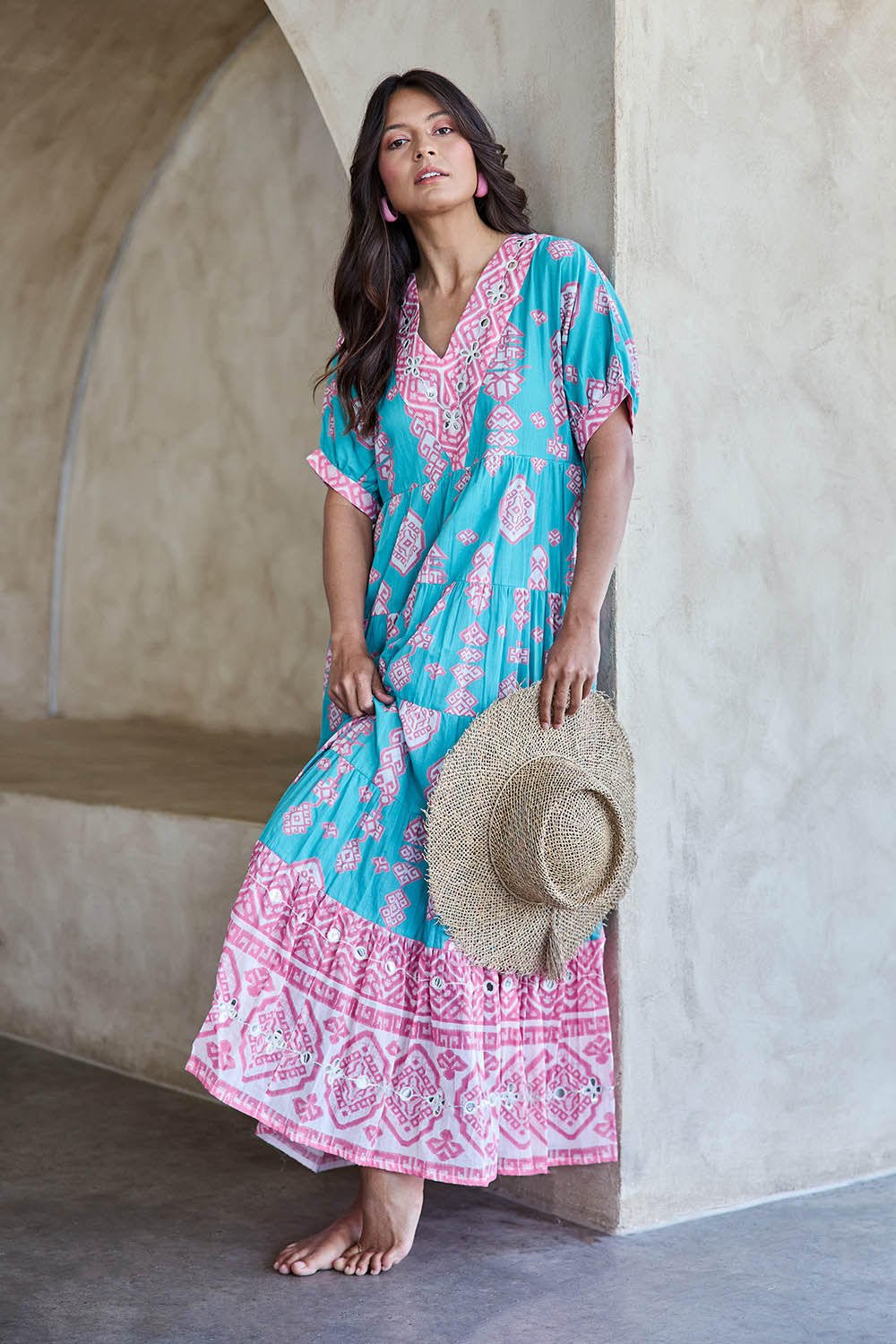 Model Tahneei wearing size 10 of the Jim Jim Falls Cotton Long Dress – Bluepink in colour Bluepink, from the front