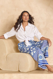 Model Tahnee wearing size 10 of the Kurrawa Beach Cotton Pant in colour Bluegreen (Blue), from the front, showing the whole outfit