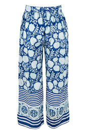 Product shot of the Kurrawa Beach Cotton Pant in colour Bluegreen (Blue), from the back