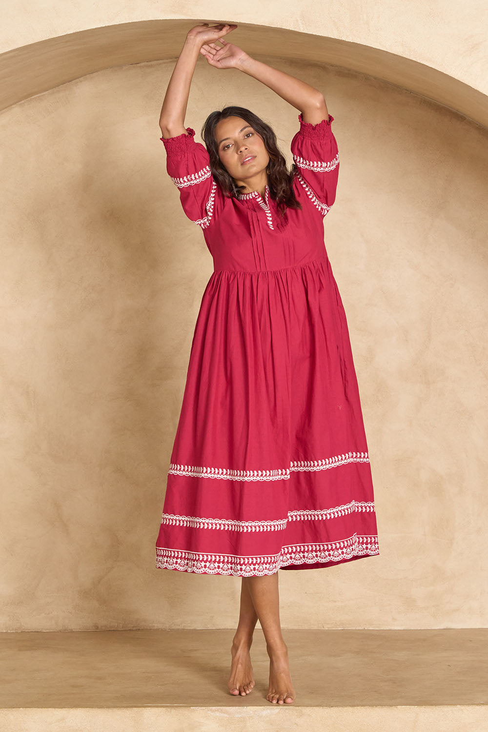 Model Tahnee wearing size 10 of the Magdelena River Cotton Dress in colour Rosebud (Pink), from the front, showing the whole outfit