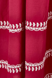 Product shot of the Magdelena River Cotton Dress in colour Rosebud (Pink), detail
