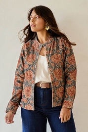 Model Tahnee wearing size 10 of the Adelong Falls Corduroy Jacket in colour Ornate, from the front, cropped image