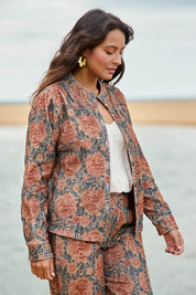 Model Tahnee wearing size 10 of the Adelong Falls Corduroy Jacket in colour Ornate, from the front, showing the whole outfit