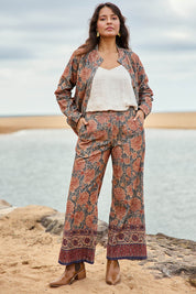 Model Tahnee wearing size 10 of the Adelong Falls Corduroy Jacket in colour Ornate, from the front, showing the whole outfit