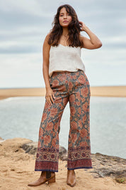 Model Tahnee wearing size 10 of the Adelong Falls Corduroy Pant in colour Ornate, from the front, showing the whole outfit