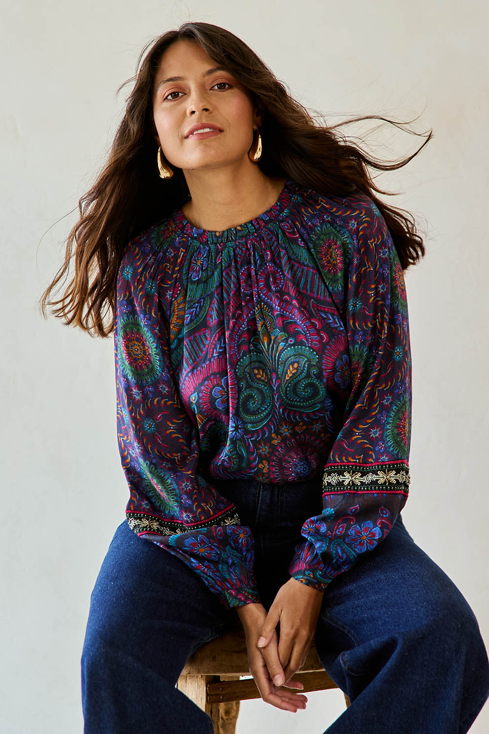 Model Tahnee wearing size 10 of the Finke Gorge Blouse in colour Paisley, from the front, cropped image