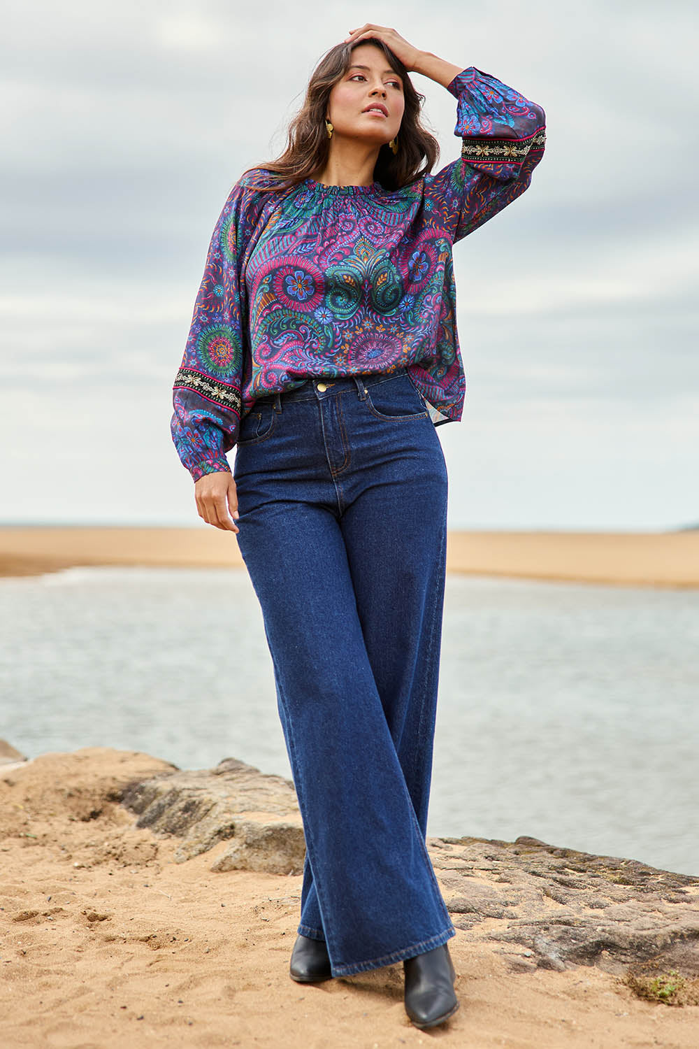 Model Tahnee wearing size 10 of the Finke Gorge Blouse in colour Paisley, from the front, showing the whole outfit