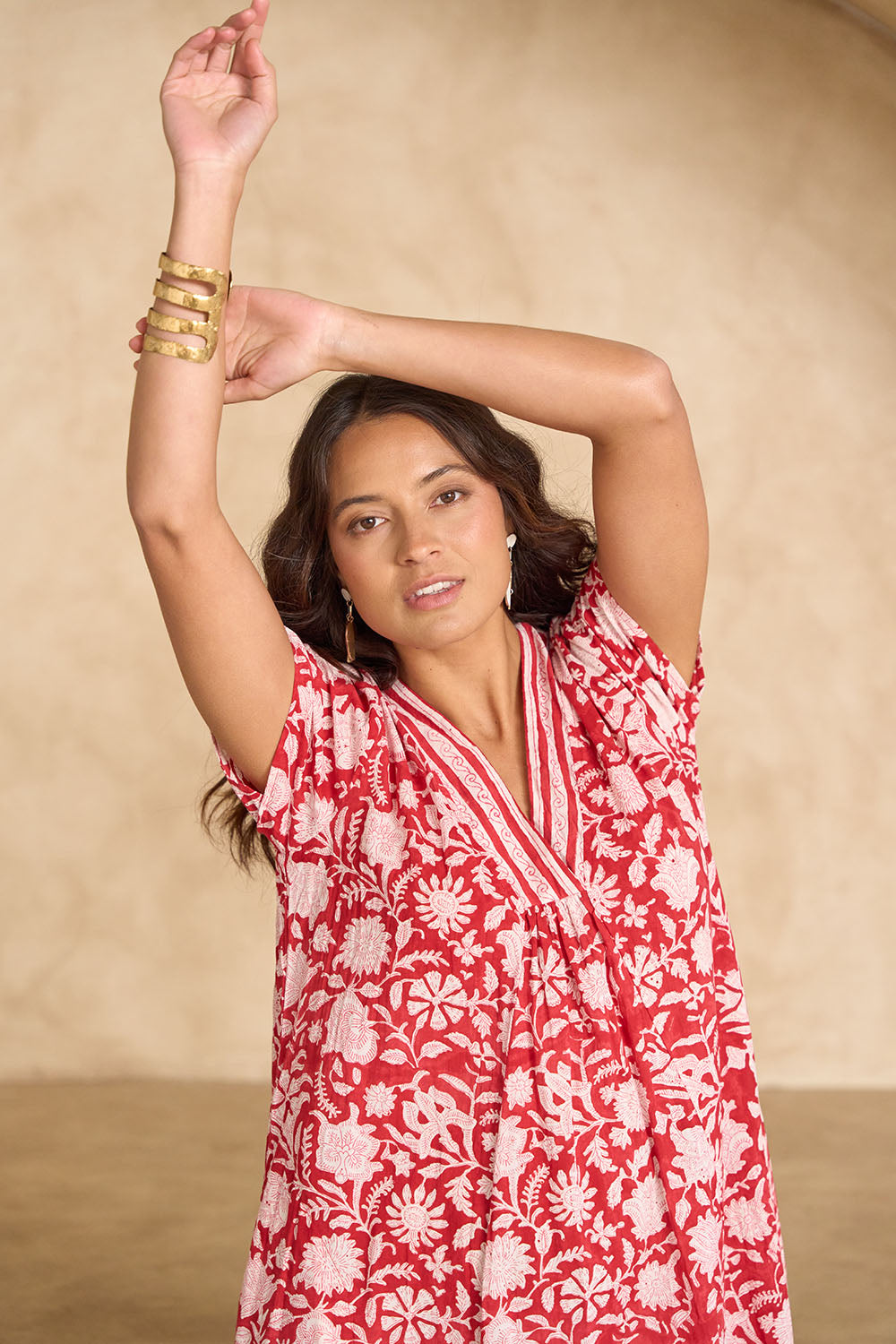 Model Tahnee wearing size 10 of the Kurrawa Beach Long Cotton Dress in colour Red (Red), from the front, cropped image