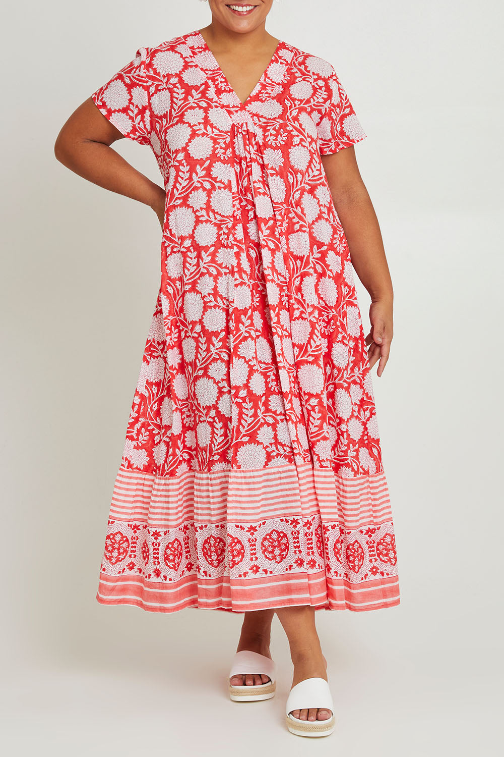 Model Ashleigh wearing size 16 of the Kurrawa Beach Long Cotton Dress in colour Redcoral (Red), from the front, cropped image