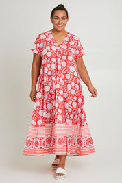 Model Ashleigh wearing size 16 of the Kurrawa Beach Long Cotton Dress in colour Redcoral (Red), from the front, showing the whole outfit