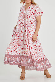 Model Keeara wearing size 16 of the Coogee Beach Cotton Maxi Dress in colour Red (Red), from the front, cropped image