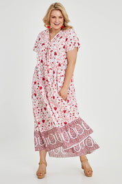 Model Keeara wearing size 16 of the Coogee Beach Cotton Maxi Dress in colour Red (Red), from the front, showing the whole outfit