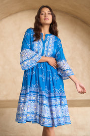 Model Tahnee wearing size 10 of the Dee Why Beach Cotton Dress in colour Bluelilac (Blue), from the front, showing the whole outfit