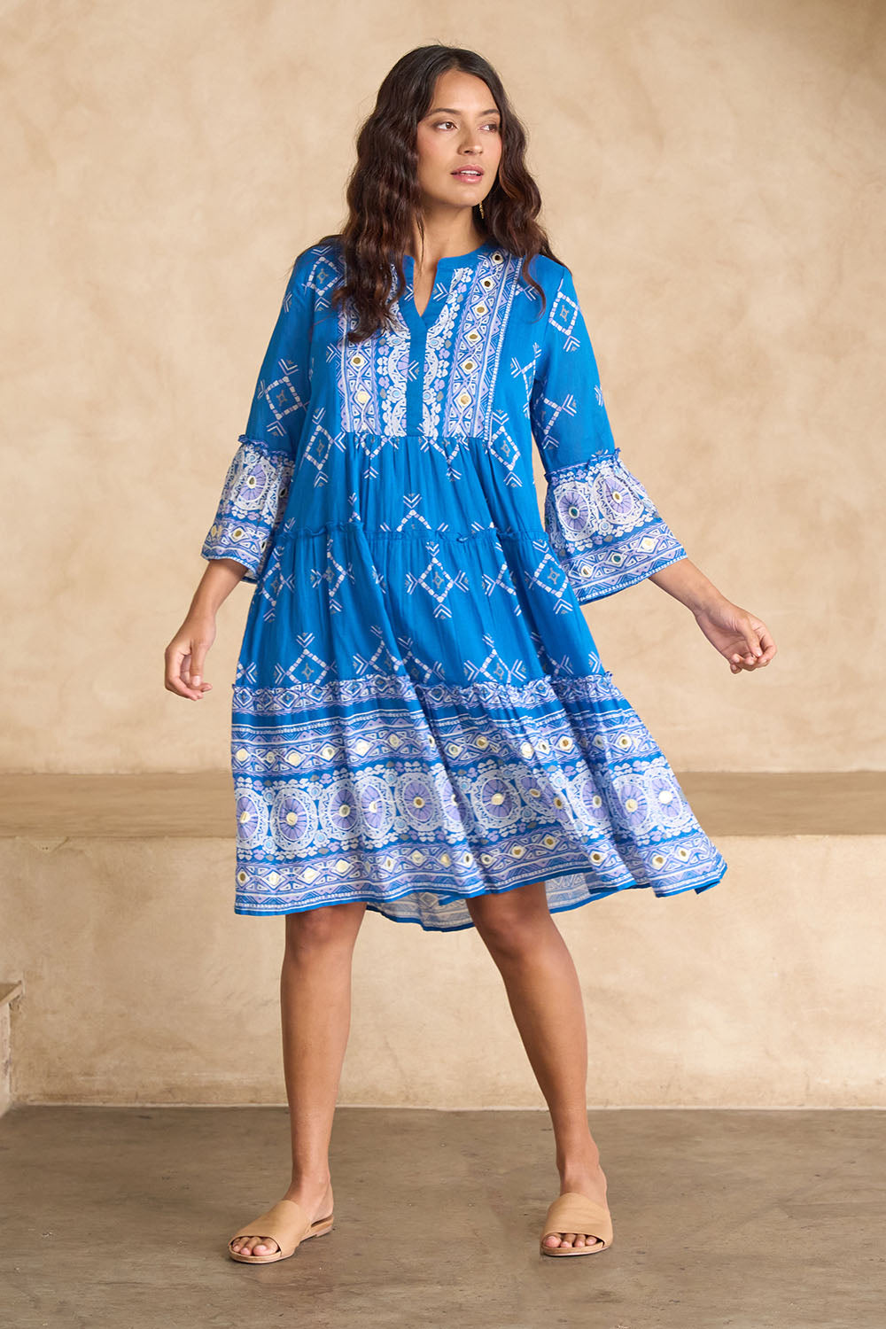 Model Tahnee wearing size 10 of the Dee Why Beach Cotton Dress in colour Bluelilac (Blue), from the front, showing the whole outfit