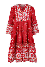 Product shot of the Dee Why Beach Cotton Dress in colour Boldred (Red), from the front