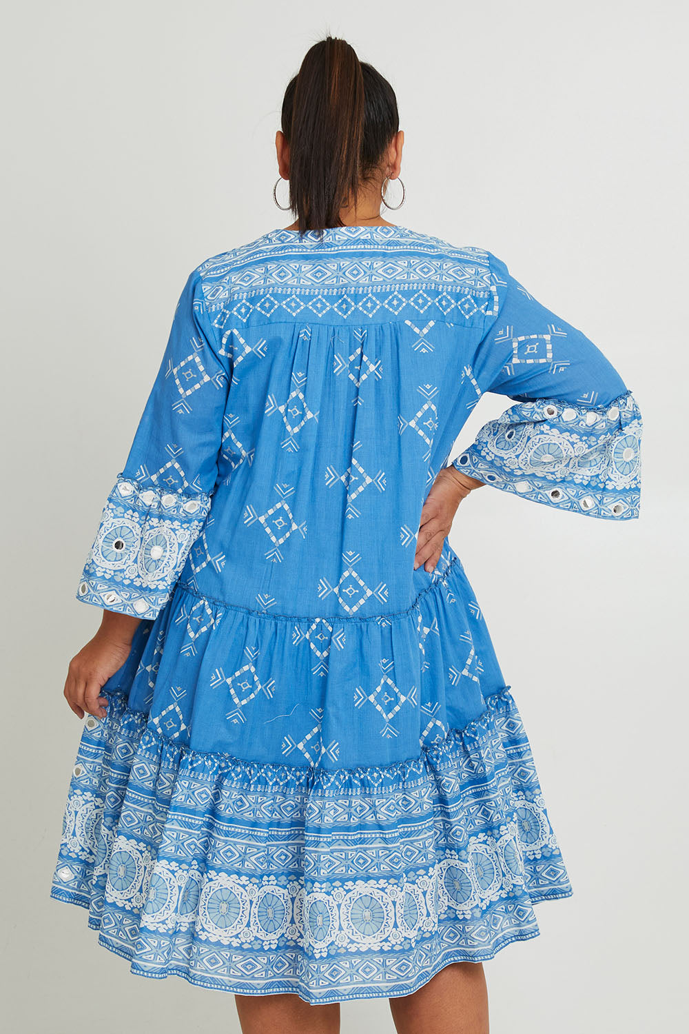 Model Ashleigh wearing size 16 of the Dee Why Beach Cotton Dress in colour Lightblue (Blue), from the back
