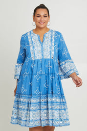 Model Ashleigh wearing size 16 of the Dee Why Beach Cotton Dress in colour Lightblue (Blue), from the front, cropped image