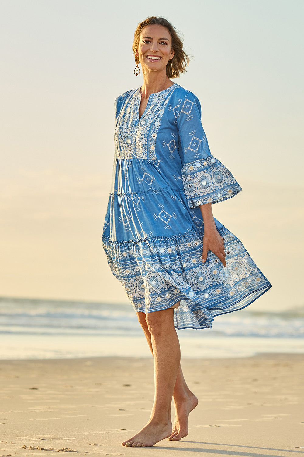 Model Riina wearing size 10 of the Dee Why Beach Cotton Dress in colour Lightblue (Blue), from the front, showing the whole outfit
