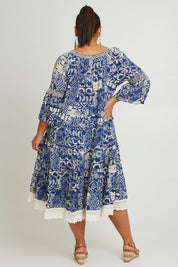 Model Jane wearing size 16 of the Tathra Beach Cotton Dress in colour Blue (Blue), from the back