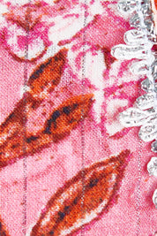 Product shot of the Sandy Bay Dress in colour Pinkorange (Pink), detail