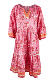 Product shot of the Sandy Bay Dress in colour Pinkorange (Pink), from the front