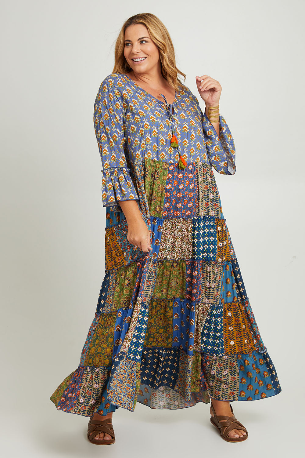 Model Fiona wearing size 16 of the Brighton Beach Maxi Dress in colour Patchblue (Blue), from the front, showing the whole outfit
