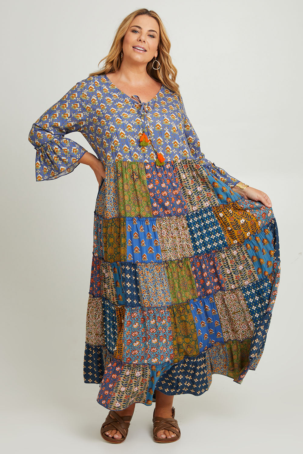 Model Fiona wearing size 16 of the Brighton Beach Maxi Dress in colour Patchblue (Blue), from the front, showing the whole outfit
