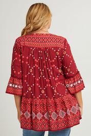 Model Fiona wearing size 16 of the Balmoral Beach Top in colour Rust (Red), from the back