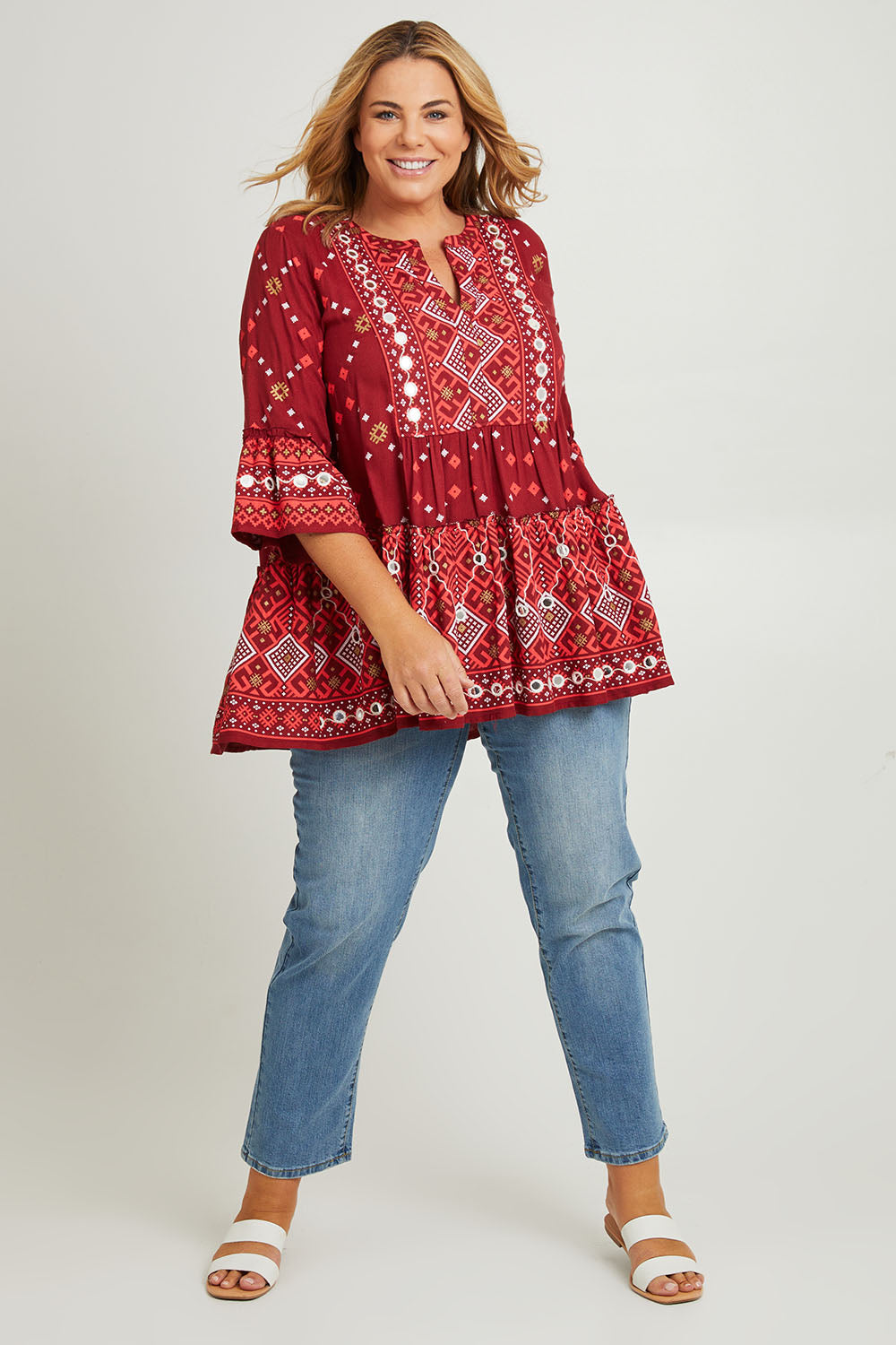 Model Fiona wearing size 16 of the Balmoral Beach Top in colour Rust (Red), from the front, showing the whole outfit