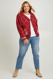 Model Fiona wearing size 16 of the Balmoral Beach Jacket in colour Rust (Red), from the front, showing the whole outfit