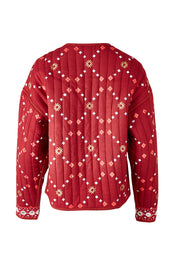 Product shot of the Balmoral Beach Jacket in colour Rust (Red), from the back