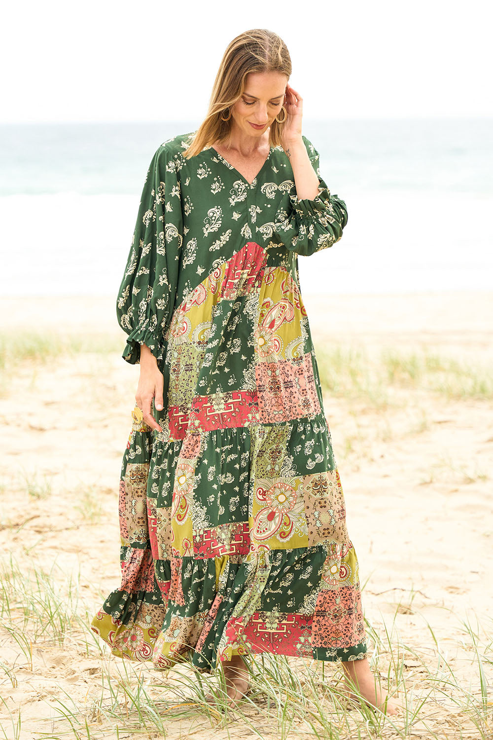 Model Riina wearing size 10 of the Middleton Beach Maxi Dress in colour Patcholive (Green), from the front, showing the whole outfit